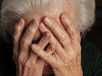 Portrait of an aged woman, looking sad - WWF04580