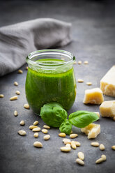 Glass of homemade pesto Genovese and ingredients - LVF07617