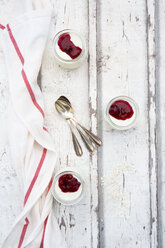 Three glasses of rice pudding with berry compote - LVF07624