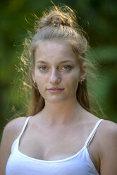 Portrait of freckled teenage girl in summer - LBF02313