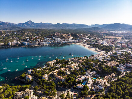 Spain, Baleares, Mallorca, Calvia region, Aerial view of Santa ponca, Marina, Serra de Tramuntana in the background - AMF06581