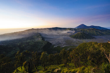 Indonesia, Java, Bromo Tengger Semeru National Park, Mount Bromo volcanic crater at sunrise - RUNF00685