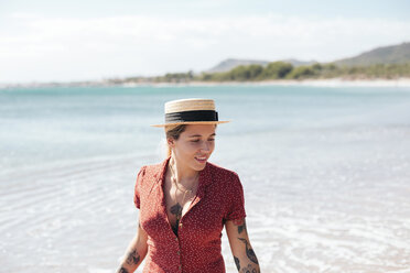 Spain, Mallorca, portrait of tattooed young woman on the beach - LOTF00016