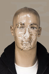 Damaged head of male display dummy glued with sellotape - SKAF00133