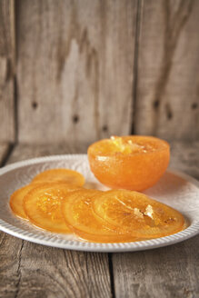 Sliced candied orange on plate - EPF00524