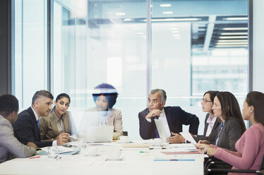 Business people talking in conference room meeting - HOXF04274