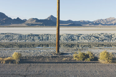 Telephone pole and remote desert road in the Salt Flats - MINF10023