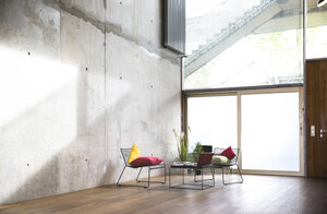 Sitting area in a loft at concrete wall - FKF03156