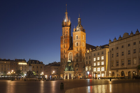 Poland, Krakow, Old Town, city skyline with St. Mary's Basilica at night stock photo