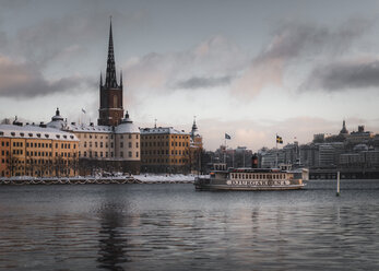 Ferry by Riddarholmen Church in Stockholm, Sweden - FOLF09773
