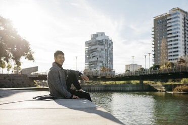 Spain, Barcelona, young man relaxing in the city - JRFF02457