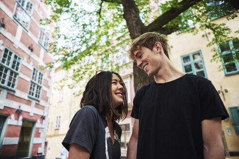 Couple smiling outdoors in Stockholm - FOLF10101