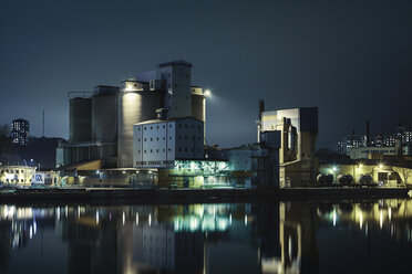 Silo and factory at night in Stockholm, Sweden - FOLF10129