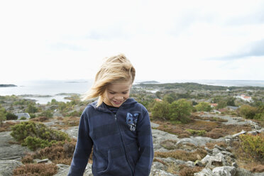 Happy boy on rocks by the sea - FOLF10132