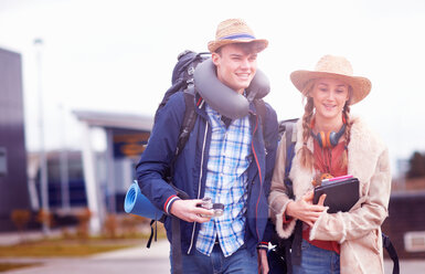 Backpacker couple at airport - CUF46570