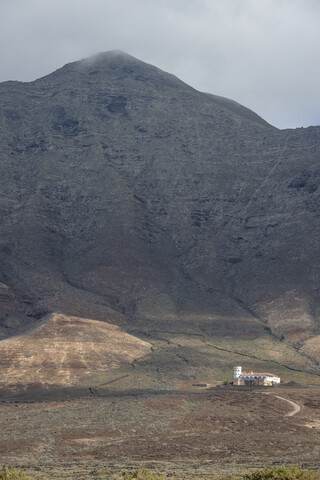 Spain, Canary Islands, Fuerteventura, Cofete, Villa Winter in rocky cliffs stock photo