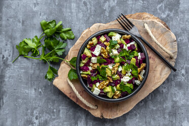 Bowl of beetroot salad with avocado, feta, walnuts and parsley - SARF04052