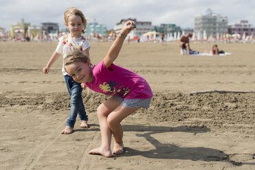 Two playful little girls on the beach - PSIF00215