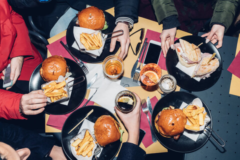 Table of burger and chips meal stock photo
