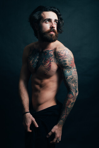 Portrait of hipster with tattoos stock photo