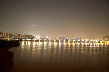 Illumination of Banpo Bridge reflected in water, Han River, Seoul, South Korea - CUF48027