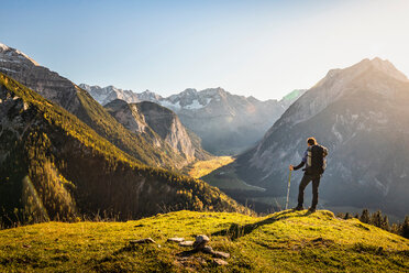 Hiker enjoying view, Karwendel region, Hinterriss, Tirol, Austria - CUF48301