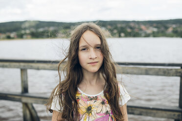 Portrait of girl by lake in Sweden - FOLF10280