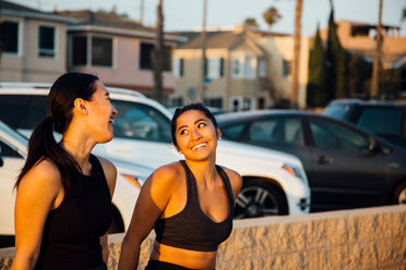 Friends talking by beach, Long Beach, California, US - ISF20221