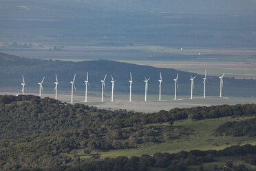 Spain, Andalusia, Tarifa, row of wind wheels at landscape - KBF00456