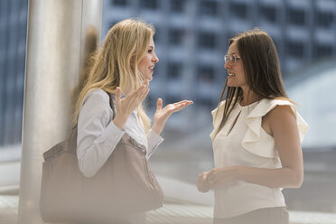 Two women talking in the city - SBOF01620