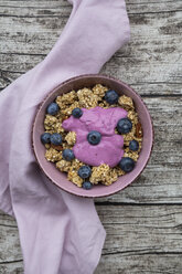 Bowl of Granola with almonds, blueberries and bluebery yoghurt - LVF07663