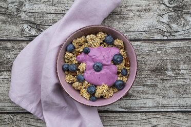 Bowl of Granola with almonds, blueberries and bluebery yoghurt - LVF07664