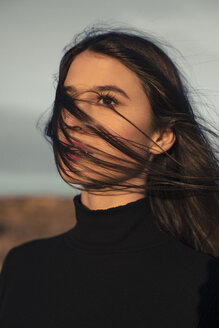 Portrait of teenage girl at sunset - ACPF00378