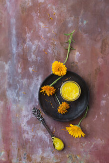 Dried marigold blossoms and marigold salve - MYF02068