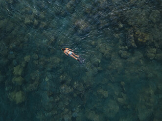 Indonesia, Bali, Woman snorkeling - KNTF02603