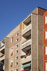 Germany, Berlin-Mitte, concrete tower block with balconies - GWF05811