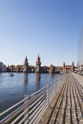 Germany, Berlin-Kreuzberg, view to Oberbaum Bridge at sunlight - GWF05813