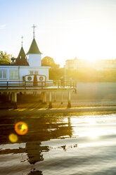 Germany, Usedom, Ahlbeck, sea bridge at sunset - PUF01355