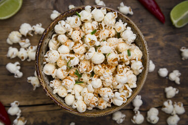 Bowl of popcorn flavoured with chili and lime - LVF07695