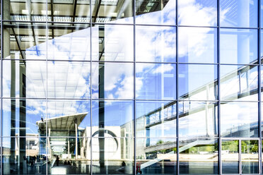 Germany, Berlin, view to Paul-Loebe-Building, Marie-Eisabeth-Lueders-Building mirrored in the glass facade - PUF01364