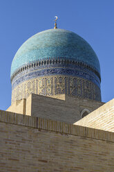 Exterior view of 16th century Po-i-Kalyan mosque with a blue tiled dome in Bukhara, a UNESCO world heritage site. - MINF10124