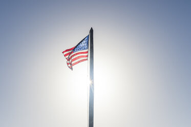 USA, Florida, Key West, American flag at backlight - RUNF01007