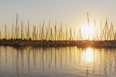 Germany, Saxony, Leipzig, Markkleeberg, Lake Cospuden, Marina, Pier 1 at sunset - GWF05836