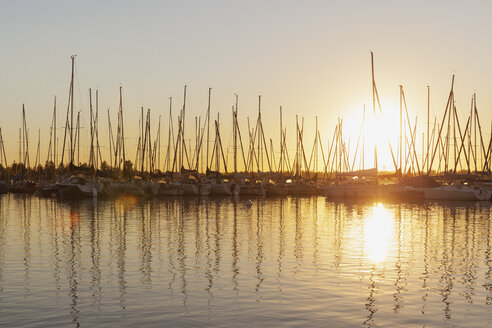 Germany, Saxony, Leipzig, Markkleeberg, Lake Cospuden, Marina, Pier 1 at sunset - GWF05836