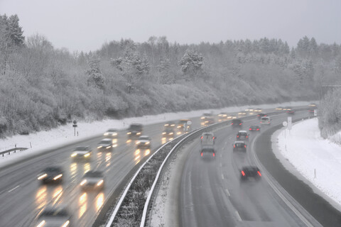 Germany, motorway in winter, icy road and traffic stock photo