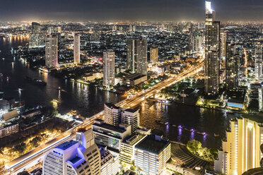 Thailand, Bangkok, aerial view of the city with Chao Phraya river at night - WPEF01357