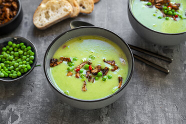 Bowls of pea soup with fried tofu, red chili pepper and spring onions - SARF04090