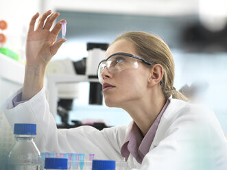 Scientist preparing a sample in a vial ready for analysis in the laboratory - ABRF00306