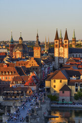 Germany, Bavaria, Franconia, Wurzburg, Historic old town at sunset - RUEF02098