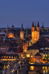 Germany, Bavaria, Franconia, Wurzburg, Historic old town at blue hour - RUEF02100